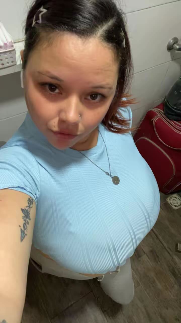 A girl from Uruguay checking her camera angle before a chat